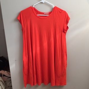 Bright tangerine swing dress with pockets